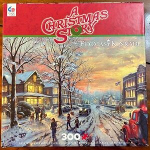 Thomas Kinkade Winter Evening Puzzle with Red and Blue Hues